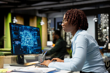 Black woman specialist examine KPI reports with artificial intelligence tools on computer, working...