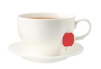 Tea brewing. Cup with tea bag isolated on white