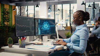 Equity analyst uses AI for companies earnings research to assess stock market value, taking notes. Trader conducts financial analysis to improve investments using artificial intelligence