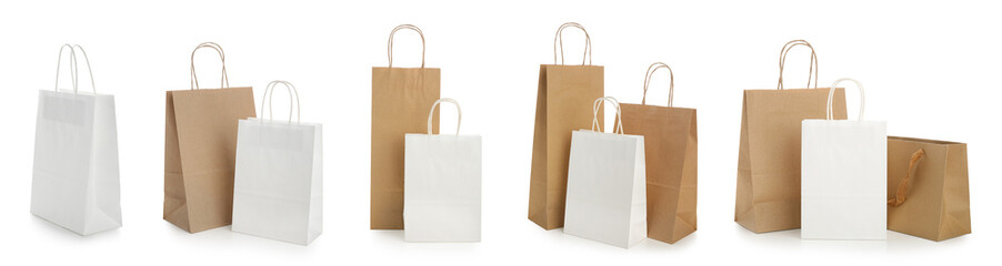 Set of paper shopping bags on white background