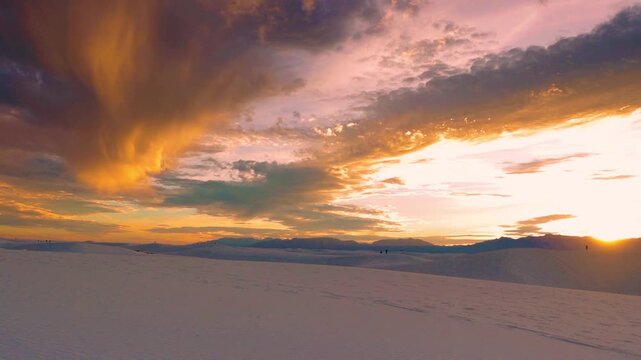 Dramatic Sunset Over The Gypsum Sand Dune and San Andres Mountains, White Sand National Park, New Mexico, USA