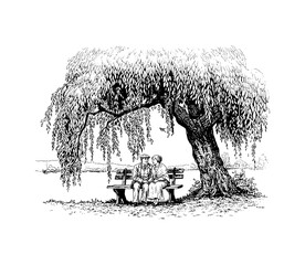 Elderly couple sitting on a park bench under a large weeping willow tree enjoying a peaceful moment together