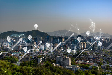 A panoramic cityscape features a digital network overlay with rising arrows and currency icons, illustrating economic growth and financial connectivity for smart city development and fintech concepts.