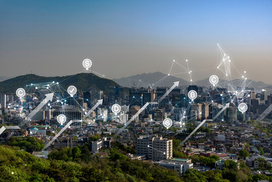 A panoramic cityscape features a digital network overlay with rising arrows and currency icons, illustrating economic growth and financial connectivity for smart city development and fintech concepts.