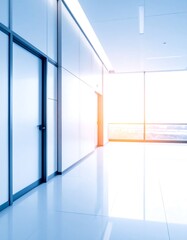 Bright, sterile hallway with a white wall, blue door, and sunlit windows. Shiny tiled floor