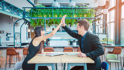 Businessman and woman are negotiating business deals, signing business contracts, celebrating business successes and partnerships, and experiencing the business world on large online platforms