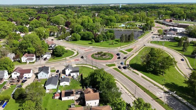 Aerial of Appleton Wisconsin on sunny Summer Day.  Neighborhoods and roundabout below.