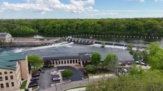 Aerial of Appleton Wisconsin on sunny Summer Day.  Approaching Dam and Fox River