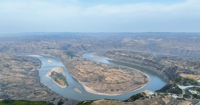 Aerial time-lapse of the Qiankun Bay, where the Yellow River carves a majestic, serpentine arc through China&rsquo;s Loess Plateau.