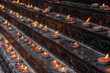 Burning candles in the Louhan Temple in Chongqing, China.