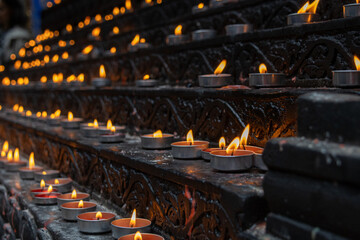 Burning candles in the Louhan Temple in Chongqing, China.