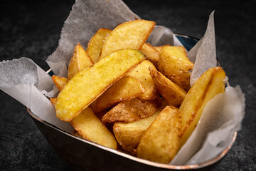 Crispy French Fries On Dark
