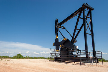 black oil drilling jack in the desert in the USA