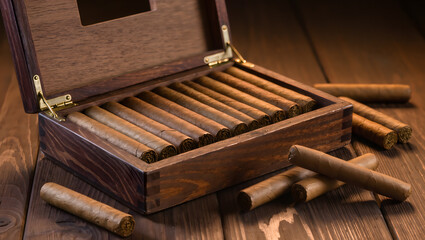 Premium hand-rolled cigars in an open wooden humidor box on a dark rustic table