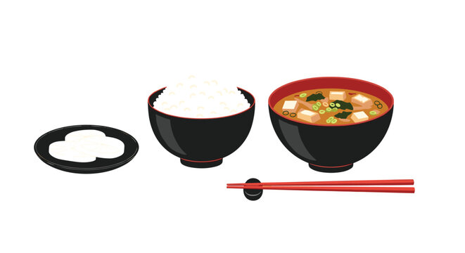 Simple and traditional Japanese meal set featuring a bowl of white rice, a bowl of miso soup, and a side of pickles.
