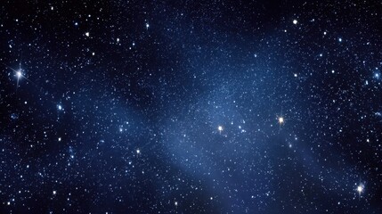 Obraz premium Vast Starry Night Sky with Twinkling Celestial Lights and Deep Blue Cosmic Space Background