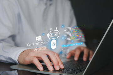 Businessman using laptop with AI assistant chatbot hologram. Concept of smart artificial intelligence technology, virtual customer service, automated online support, and digital machine learning.