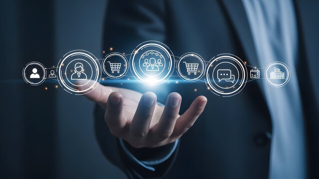 Hand holding glowing digital fingerprint icons representing data security and biometric identification - Powered by Adobe