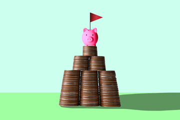 piggy bank coin pyramid savings goal financial success wealth achievement concept