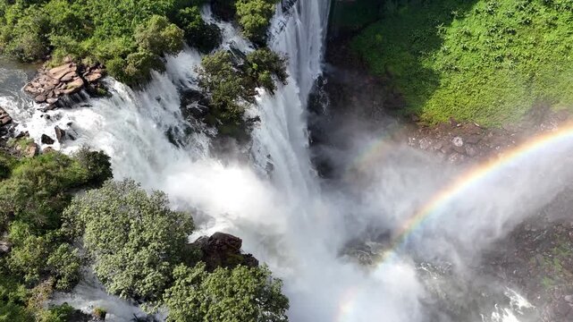 Aerial drone journey over the roaring crest and misty spray of Calandula Falls in Malanje Province, Angola, Africa, along the Lucala River