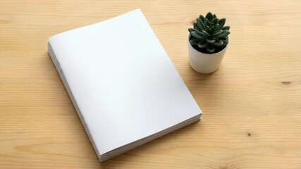 An open blank white book rests on a wooden desk beside a potted green plant. Natural light illuminates the scene. Professional composition with ample space for text overlay.