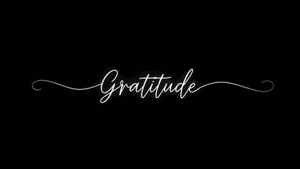 Gratitude written in elegant white cursive on black background