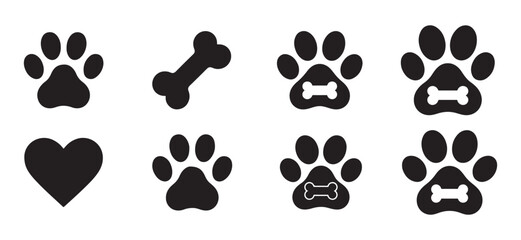 Vector set of dog paw prints, bone and heart icons. Minimalist black silhouettes for pet care, veterinary clinic branding, and animal love designs. Isolated on white background. © Sen