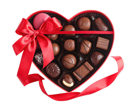 Heart shaped box of chocolates with a red ribbon bow,white background