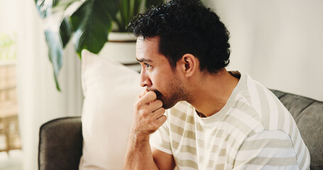 House, biting nails and man on sofa, nervous and stress with mental health, thinking and bad habit....