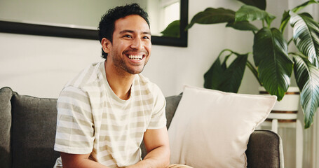 Home, watching tv and happy man on sofa, funny and entertainment with comedy film. Asian person,...