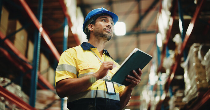 Man, tablet and checklist with inspection at warehouse, scroll or notes for inventory management. Person, tech and low angle with application, stock or solution for supply chain at distribution plant