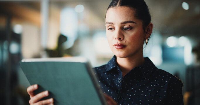 Journalist, reading or woman with tablet in creative agency, check publication app or online newspaper. Review article, source verification or reporter research with tech, story or feature evaluation