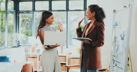 Creative women, high five and tech for designer agency in office for internship or project...