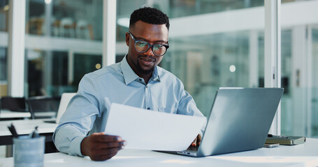 Documents, laptop and business black man for financial review, proposal and budget planning for...