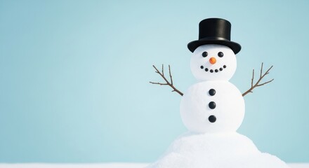 Snowman wearing black hat on snow pile.