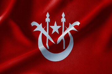 Obraz premium State flag of Kelantan Malaysia displaying islamic symbolism on waving fabric background.