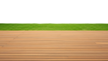 Wooden deck with green grass background