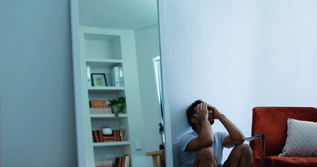 Stress, frustrated man and overwhelmed in house, poor mental health or anxiety for financial...