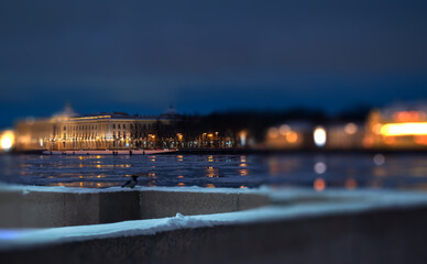View of the Neva River in winter from Admiralteiskaya embankment.The bokeh effect.