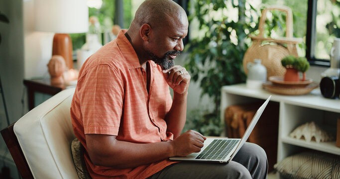 Remote work, reading or black man in home with laptop, lead update or edit of article. Freelancer, mature person or journalist in living room with technology, fact check or source contact on email.
