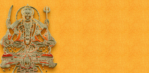 Santoshi Maa 3D Silver Embossed Style Icon on Textured Orange Background