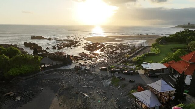 Bali beach called Prerenan north of Canggu I have recorded this drone footage at first sunlight at 5am, waiting for the sun to come up over the horizon, hitting all the notes from pink to orange, whil
