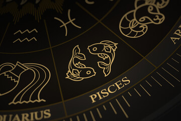 Detailed close-up of the Pisces symbol on a gold and black astrology chart wheel featuring various zodiac constellations and symbols.