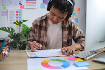 Creative Professional Focused on Drawing and Developing Ideas, Working on New Design Project