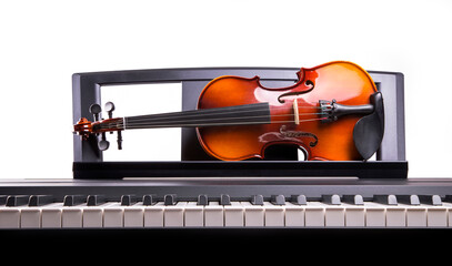 Violin on the desk electronic piano