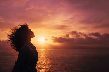Embracing Serenity: A Silhouette at Sunset Reflecting Inner Peace and Natural Beauty Amidst Vibrant Skies and Calm Waters