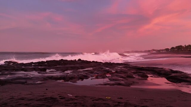Bali beach called Prerenan north of Canggu I have recorded this drone footage at first sunlight at 5am, waiting for the sun to come up over the horizon, hitting all the notes from pink to orange, whil
