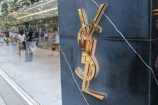 Luxury shopping at YSL in Ginza, Tokyo showcases elegant fashion and vibrant city life