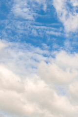 Fototapeta premium Blue Sky Background with Soft Clouds