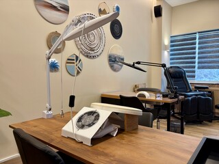 Premium coworking center for hair masters. Workplace of the hairdressers with illuminated mirrors and comfortable chairs. Concept of contemporary interior design for hairdresser. Beauty salon 